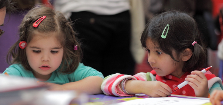 Photograph of two girls at the Cambridge Science Festival